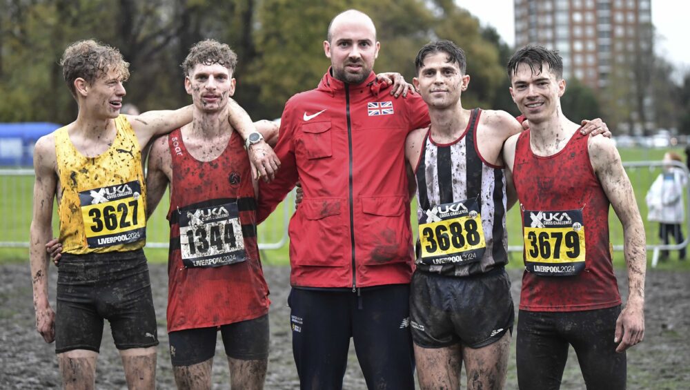 Coach Dean pictured with UoB student medallists