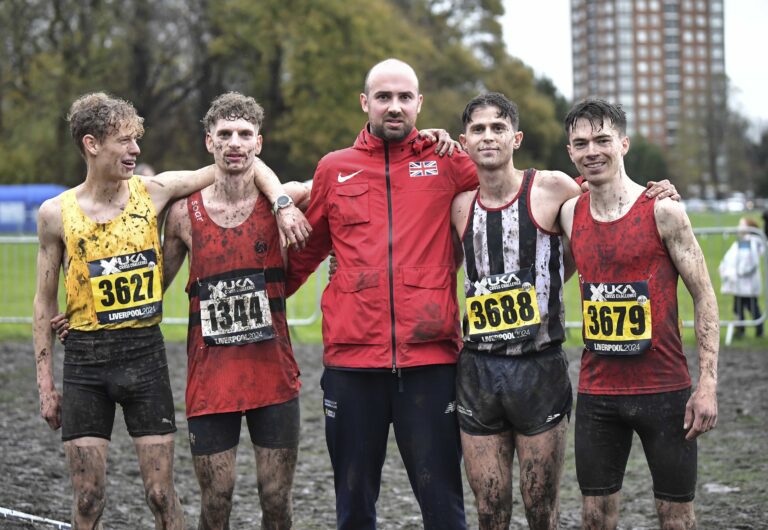 Coach Dean pictured with UoB student medallists