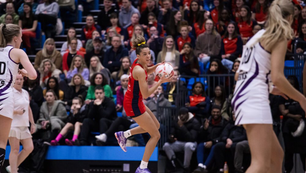 Intercept event with UOB woman holding ball