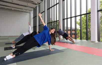 Woman doin yoga in Dojo studio